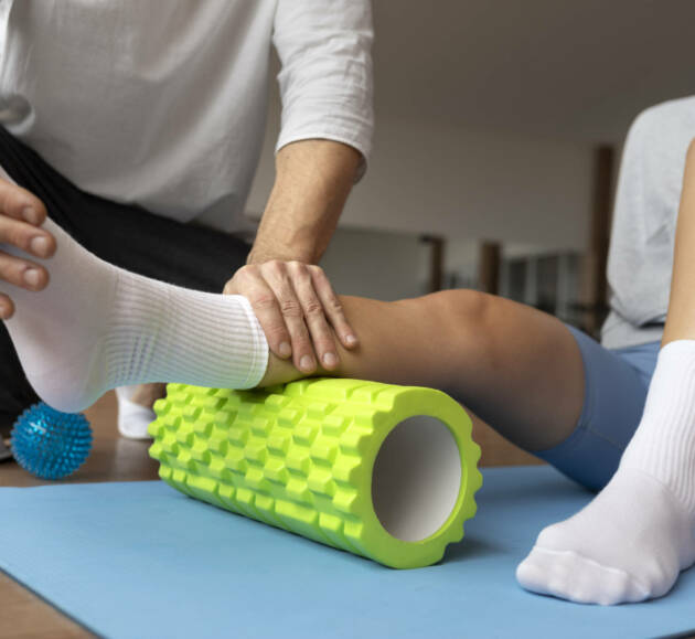 patient-doing-physical-rehabilitation-helped-by-therapists